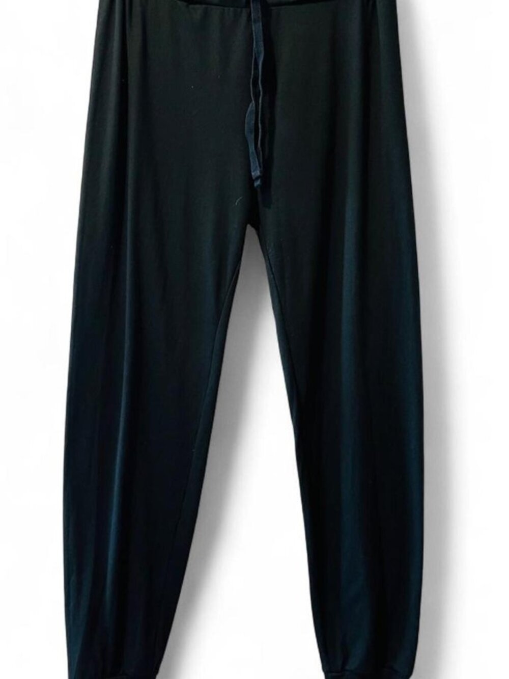 Black sweatpants with drawstring waist and tapered fit, size M